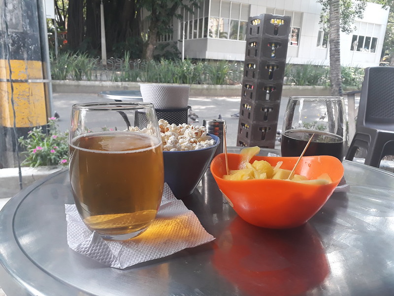 Having drinks and snacks across from Primer Parque de Laureles Medellin