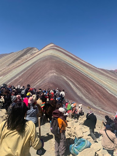 The crowds are out in full force on Rainbow Mountain.
